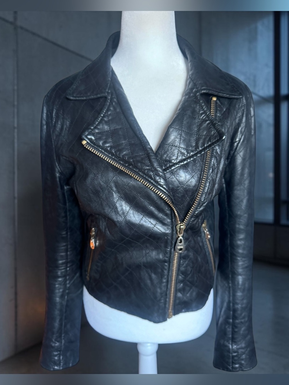Doma Black Quilted Lambskin Leather Moto Jacket with Gold Zippers